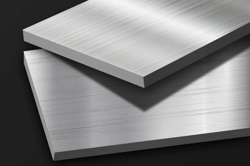 Stainless Steel vs Aluminum: How to Make the Best Choice for Your Product Design 1 Stainless steel surface highlighting strength, corrosion resistance, and industrial applications in construction and manufacturing